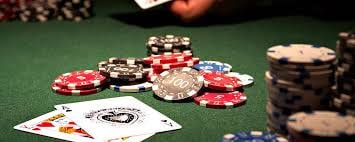 Live baccarat table at olxoto with dealer and player cards displayed on screen
